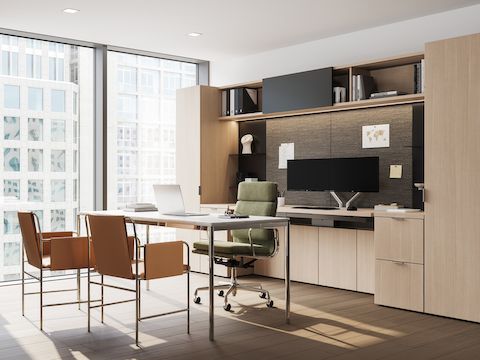 Geiger One Private office in RecoGrain Frosty Ash, with Domino Credenza, Eames Soft Pad and Envelope Guest Chairs, viewed at an angle.